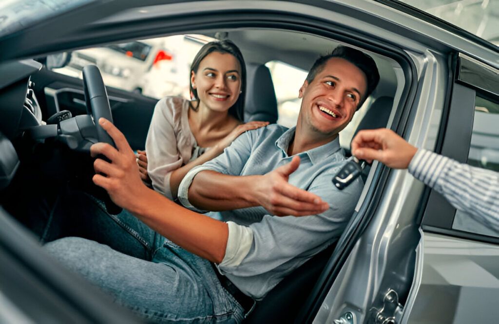 couple-car-keys-rental-handover
